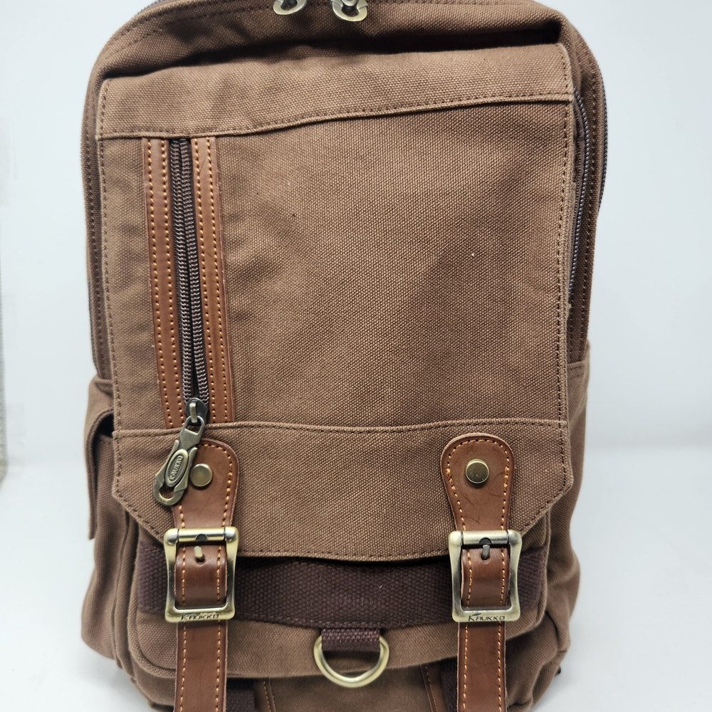 Classic Brown Canvas Backpack with Buckle Accents